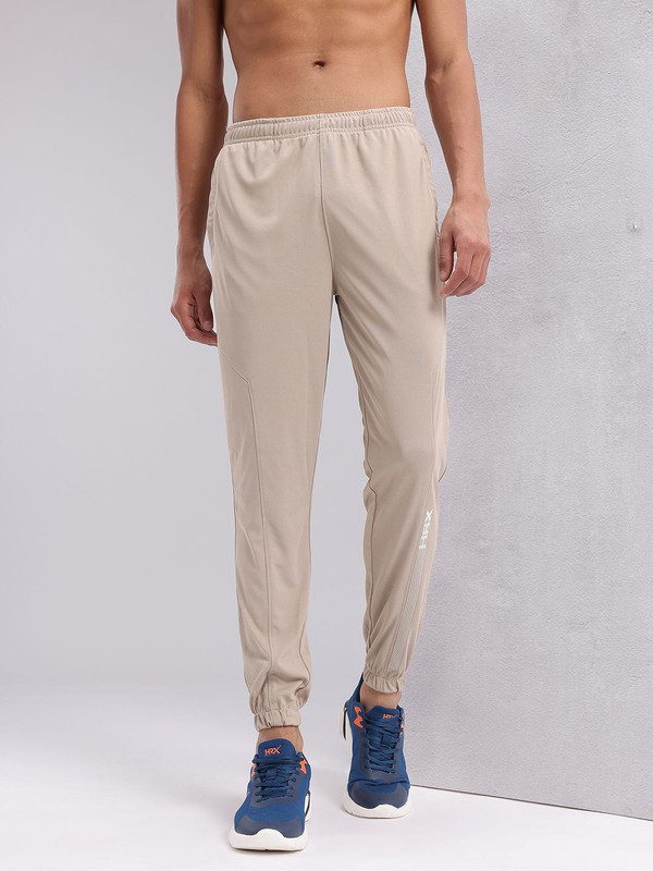 HRX by Hrithik Roshan Solid Men Beige Track Pants